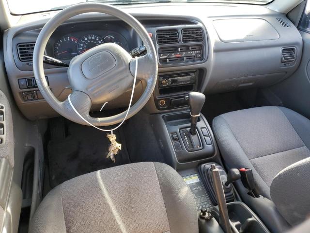 Photo 8 from auction – 2000 CHEVROLET TRACKER with VIN 2CNBJ13C9Y6933573