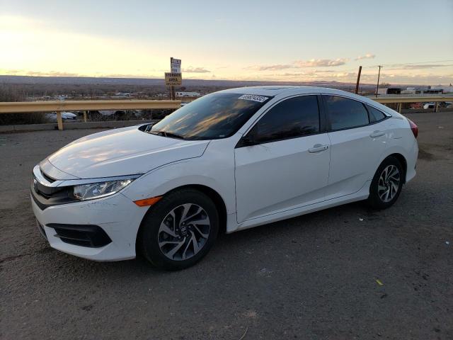 HONDA CIVIC EX 2017 with VIN 19XFC2F7XHE051719 - Photo from auction