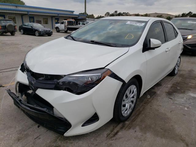 TOYOTA COROLLA L 2019 with VIN 5YFBURHEXKP883941 - Photo from auction