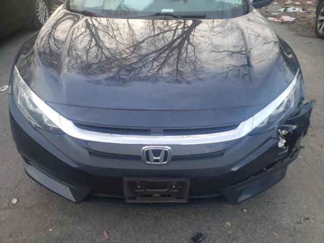 Photo 11 from auction – 2017 HONDA CIVIC LX with VIN 2HGFC2F54HH511669
