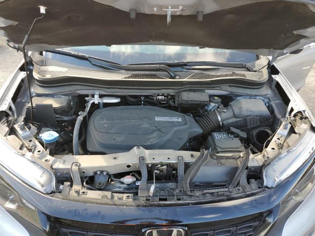 Photo 11 from auction – 2020 HONDA PASSPORT E with VIN 5FNYF7H5XLB001785