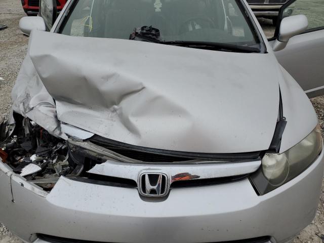 Photo 11 from auction – 2006 HONDA CIVIC with VIN JHMFA16816S009084