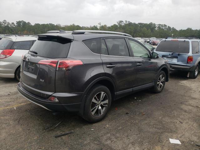 Photo 3 from auction – 2017 TOYOTA RAV4 XLE with VIN JTMWFREV3HJ716687