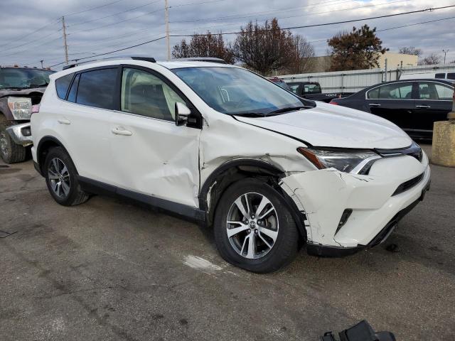 Photo 4 from auction – 2018 TOYOTA RAV4 XLE with VIN JTMRFREV1JJ256156
