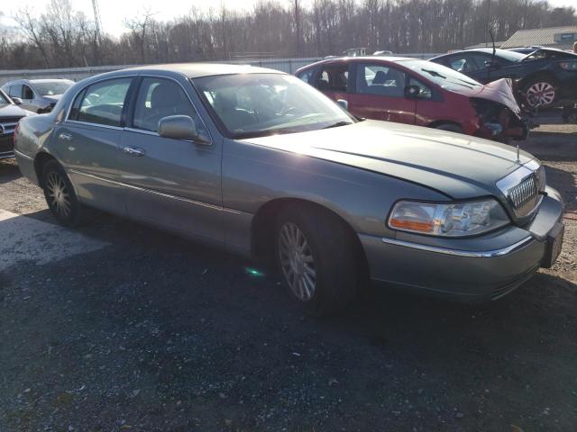 Photo 4 from auction – 2004 LINCOLN TOWN CAR E with VIN 1LNHM81W94Y604173