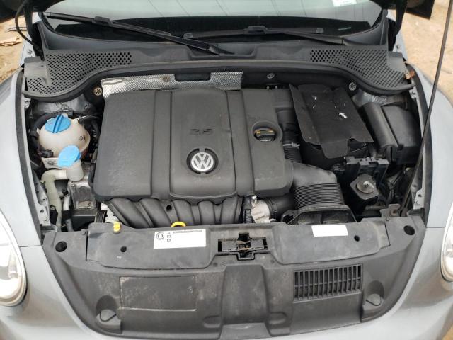 Photo 11 from auction – 2014 VOLKSWAGEN BEETLE with VIN 3VWJP7AT3EM618352