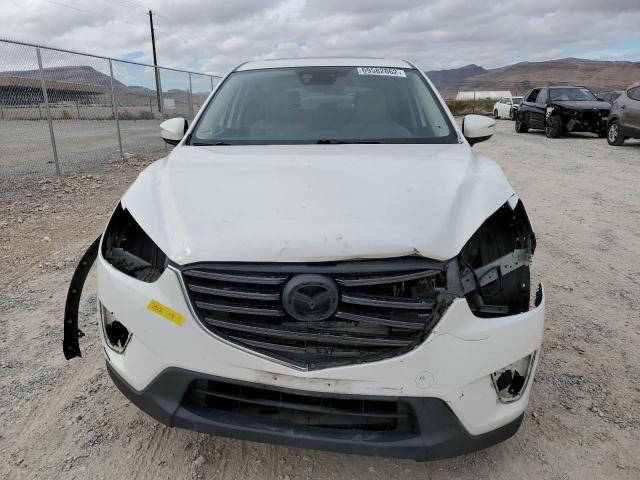 Photo 5 from auction – 2016 MAZDA CX-5 TOURI with VIN JM3KE2CY2G0646018