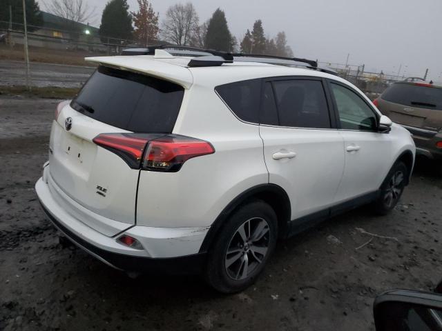 Photo 3 from auction – 2017 TOYOTA RAV4 XLE with VIN JTMRFREV7HJ708802