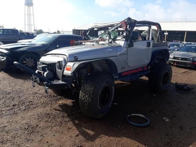 JEEP WRANGLER / 2000 with VIN 1J4FA29P8YP772813 - Photo from auction