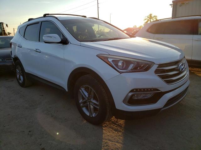 Photo 4 from auction – 2018 HYUNDAI SANTA FE S with VIN 5NMZU3LB0JH053048