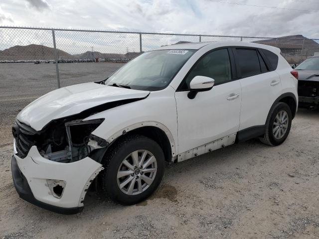 MAZDA CX-5 TOURI 2016 with VIN JM3KE2CY2G0646018 - Photo from auction