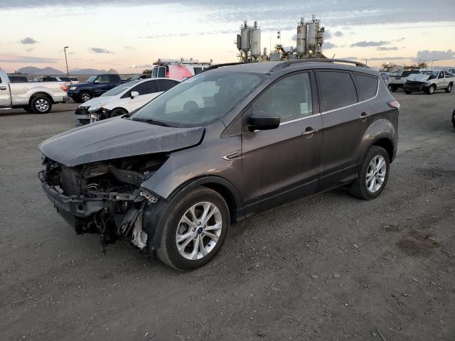 FORD ESCAPE SE 2018 with VIN 1FMCU0GDXJUB44123 - Photo from auction