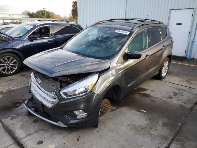 FORD ESCAPE SE 2018 with VIN 1FMCU9GD2JUA86495 - Photo from auction