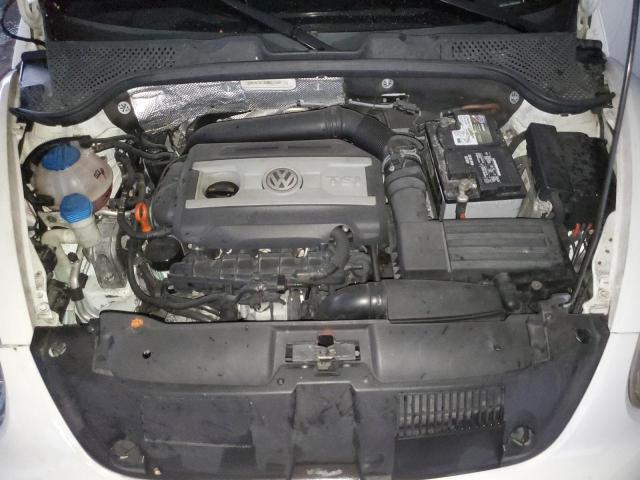 Photo 11 from auction – 2012 VOLKSWAGEN BEETLE TUR with VIN 3VWVA7AT3CM651058