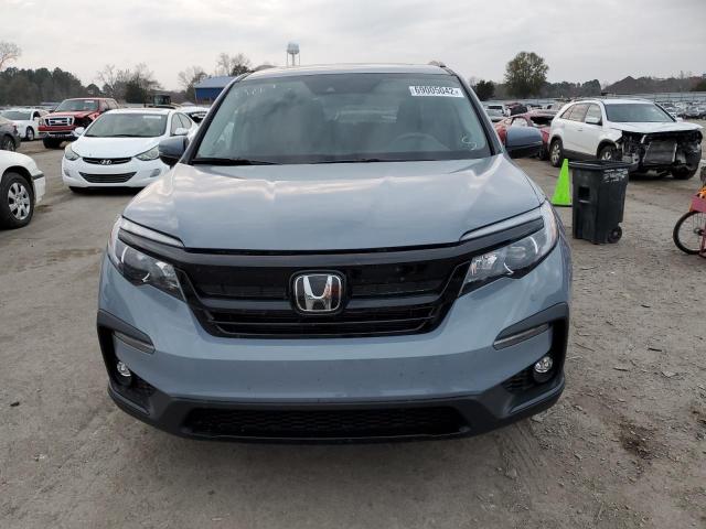 Photo 5 from auction – 2022 HONDA PILOT SE with VIN 5FNYF5H29NB033141