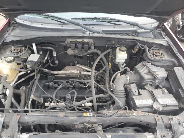 Photo 12 from auction – 2005 FORD ESCAPE XLS with VIN 1FMYU92Z85KD12520