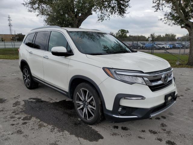 Photo 4 from auction – 2019 HONDA PILOT ELIT with VIN 5FNYF6H09KB068813