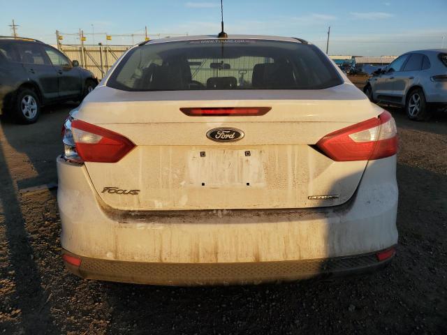 Foto 6 de la subasta – 2013 FORD FOCUS S con VIN 1FADP3E29DL151325