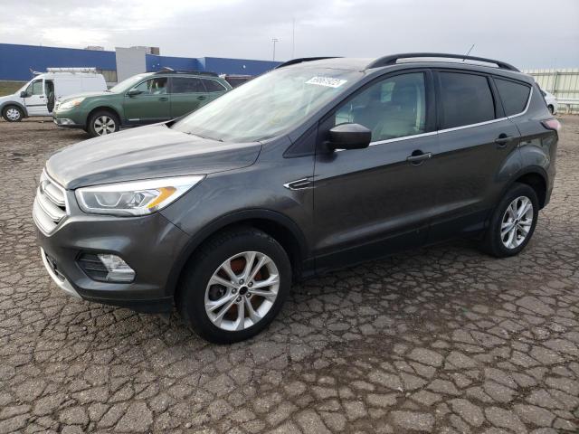 FORD ESCAPE SE 2017 with VIN 1FMCU9GD9HUA79635 - Photo from auction
