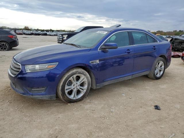 FORD TAURUS SEL 2015 with VIN 1FAHP2E8XFG135470 - Photo from auction