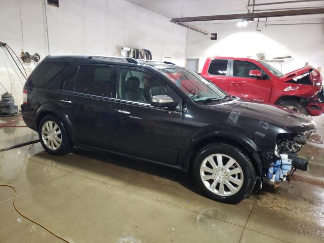 Photo 4 from auction – 2009 FORD TAURUS X L with VIN 1FMDK06W39GA05586