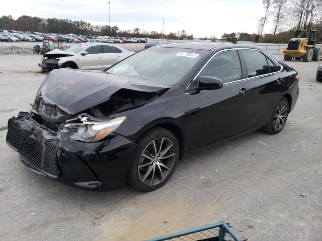 TOYOTA CAMRY LE 2015 with VIN 4T1BF1FK0FU484089 - Photo from auction