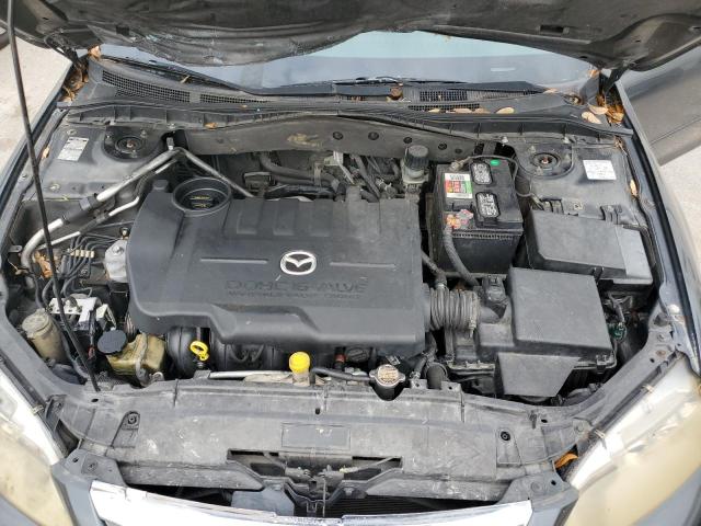 Photo 11 from auction – 2005 MAZDA 626 with VIN 1YVHP80CX55M65106