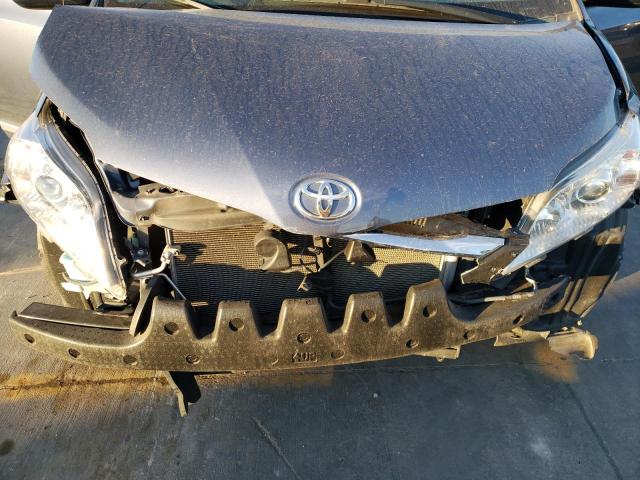 Photo 12 from auction – 2014 TOYOTA SIENNA LE with VIN 5TDKK3DC9ES471819