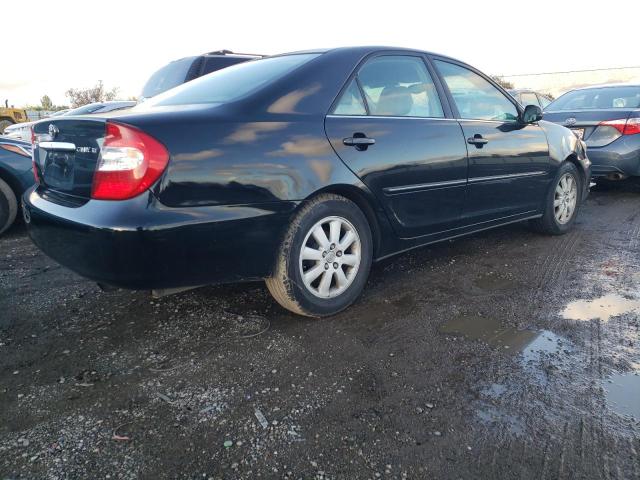 Photo 3 from auction – 2002 TOYOTA CAMRY LE with VIN 4T1BE30KX2U088690
