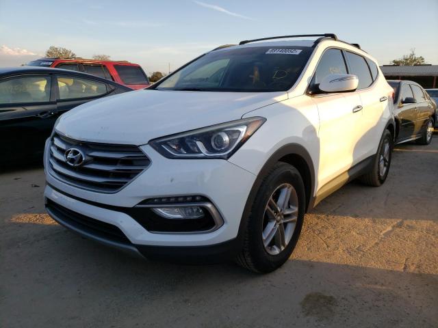 HYUNDAI SANTA FE S 2018 with VIN 5NMZU3LB0JH053048 - Photo from auction