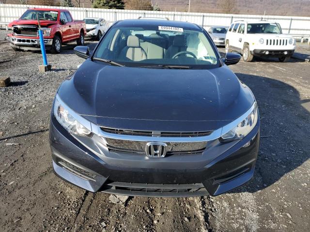 Photo 5 from auction – 2018 HONDA CIVIC LX with VIN 2HGFC2E57JH604970