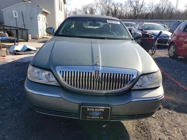 Photo 5 from auction – 2004 LINCOLN TOWN CAR E with VIN 1LNHM81W94Y604173