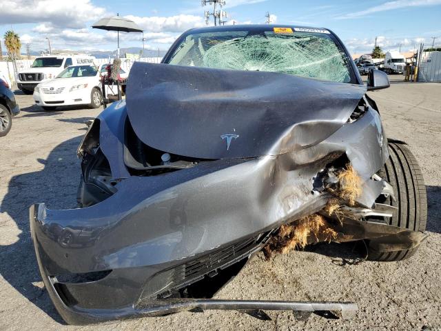 Photo 5 from auction – 2022 TESLA MODEL Y with VIN 7SAYGDEF8NF556989