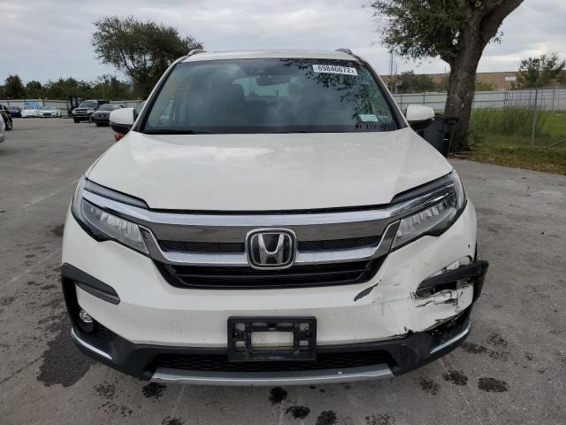 Photo 5 from auction – 2019 HONDA PILOT ELIT with VIN 5FNYF6H09KB068813