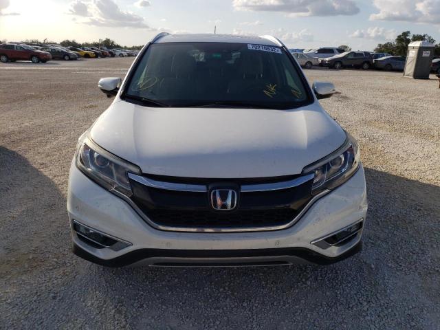 Photo 5 from auction – 2016 HONDA CR-V TOURI with VIN 5J6RM3H90GL003189