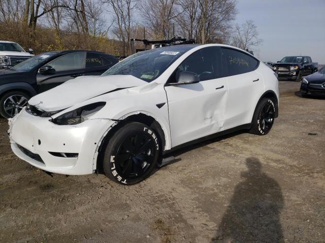 TESLA MODEL Y 2022 with VIN 7SAYGDEE6NF320817 - Photo from auction