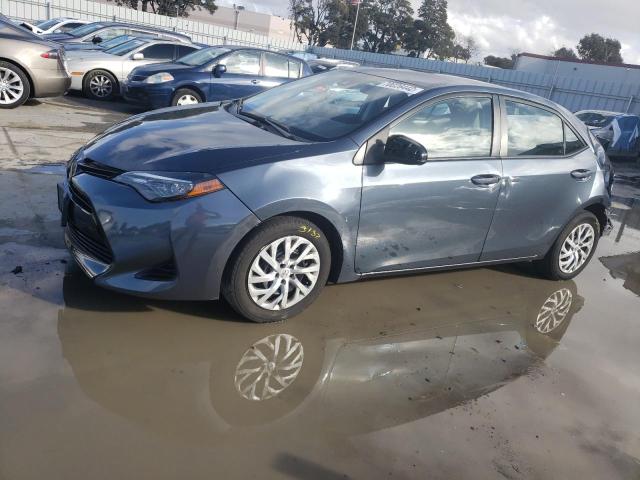 TOYOTA COROLLA L 2018 with VIN 2T1BURHE5JC084809 - Photo from auction