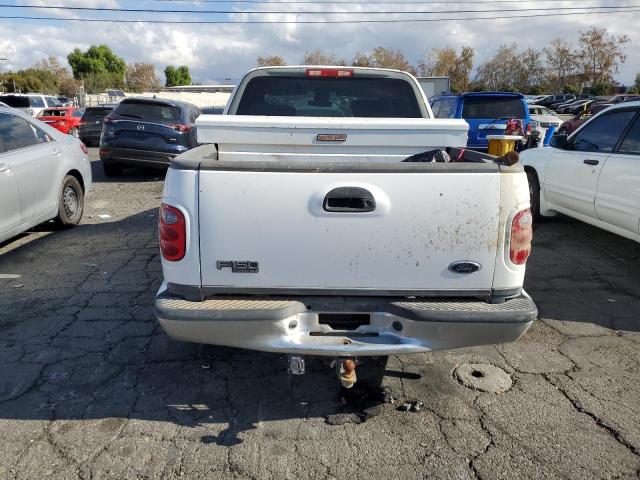 Photo 6 from auction – 2003 FORD F150 SUPER with VIN 1FTRW07673KD35202