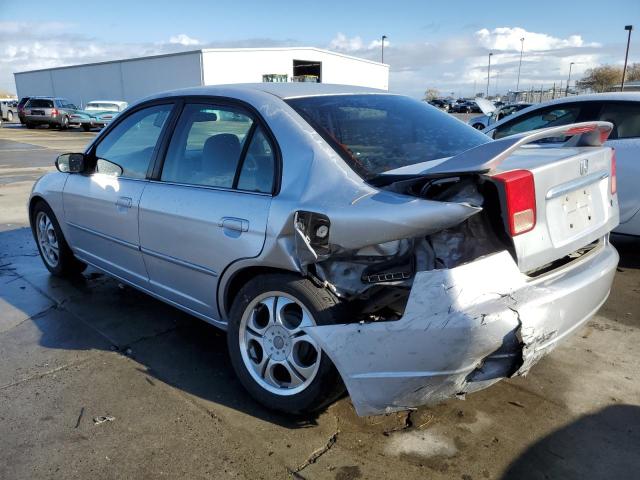 Photo 2 from auction – 2002 HONDA CIVIC LX with VIN 2HGES155X2H592551