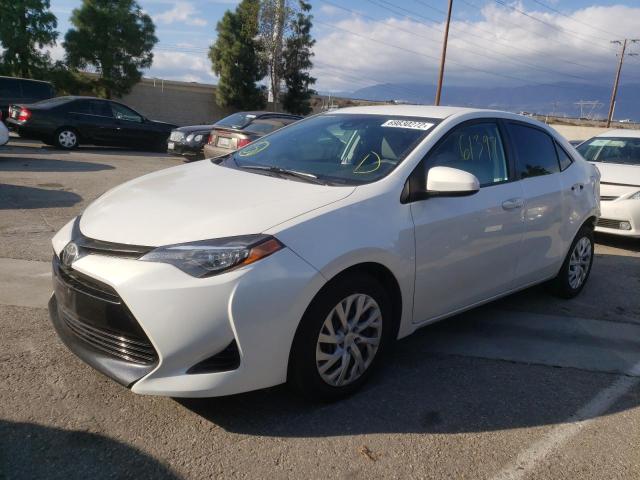 TOYOTA COROLLA L 2019 with VIN 5YFBURHEXKP894664 - Photo from auction