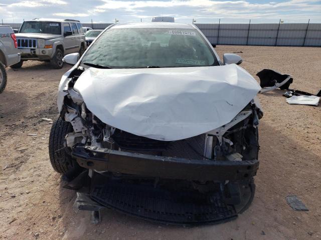 Photo 5 from auction – 2015 TOYOTA COROLLA L with VIN 5YFBURHE1FP288384