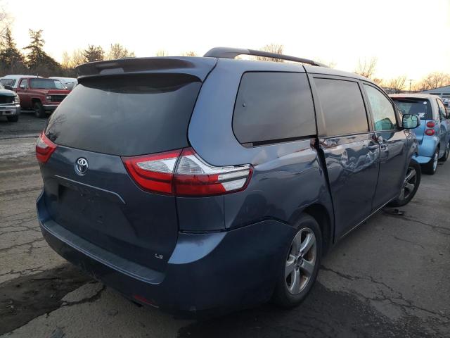 Photo 4 from auction – 2015 TOYOTA SIENNA LE with VIN 5TDKK3DC7FS667078