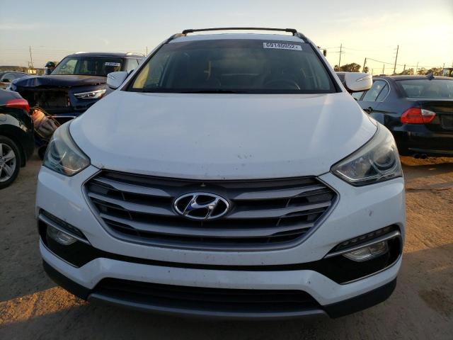 Photo 5 from auction – 2018 HYUNDAI SANTA FE S with VIN 5NMZU3LB0JH053048