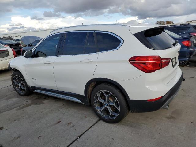 Photo 2 from auction – 2017 BMW X1 XDRIVE2 with VIN WBXHT3Z33H4A58283