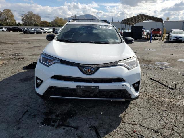 Photo 5 from auction – 2018 TOYOTA RAV4 SE with VIN JTMNFREV3JD109186
