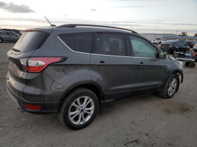 Photo 3 from auction – 2018 FORD ESCAPE SE with VIN 1FMCU0GDXJUB44123