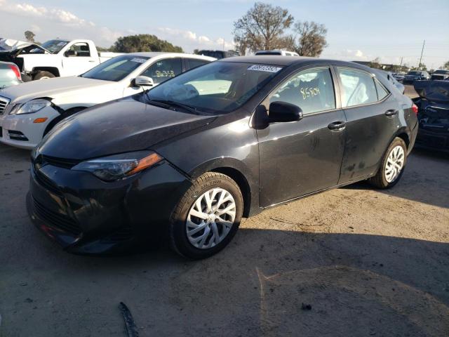 TOYOTA COROLLA L 2018 with VIN 5YFBURHE4JP850285 - Photo from auction
