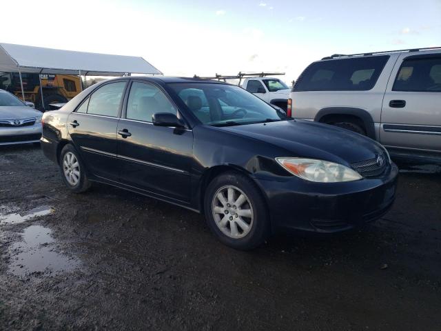 Photo 4 from auction – 2002 TOYOTA CAMRY LE with VIN 4T1BE30KX2U088690
