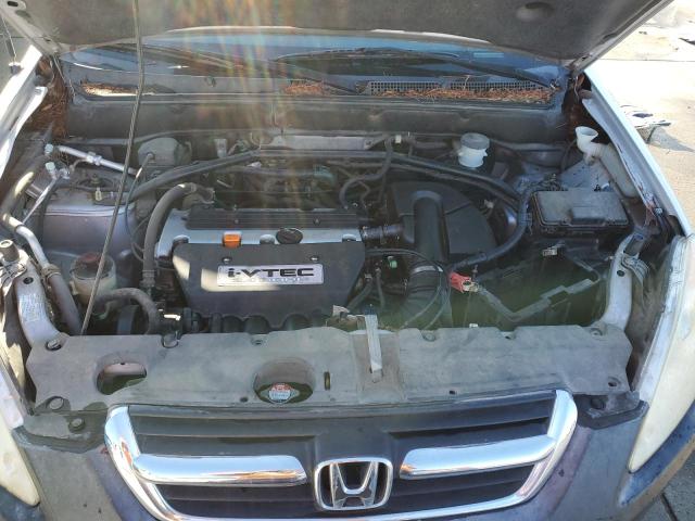 Photo 11 from auction – 2004 HONDA CR-V LX with VIN JHLRD68564C005404