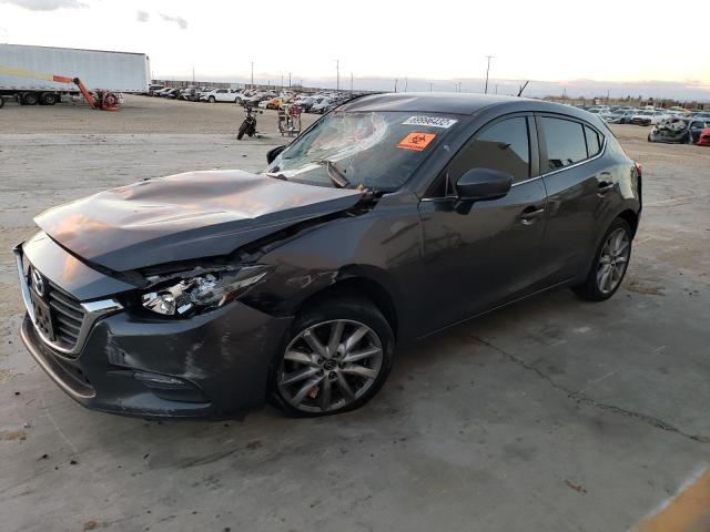 MAZDA 3 TOURING 2017 with VIN 3MZBN1L79HM150896 - Photo from auction